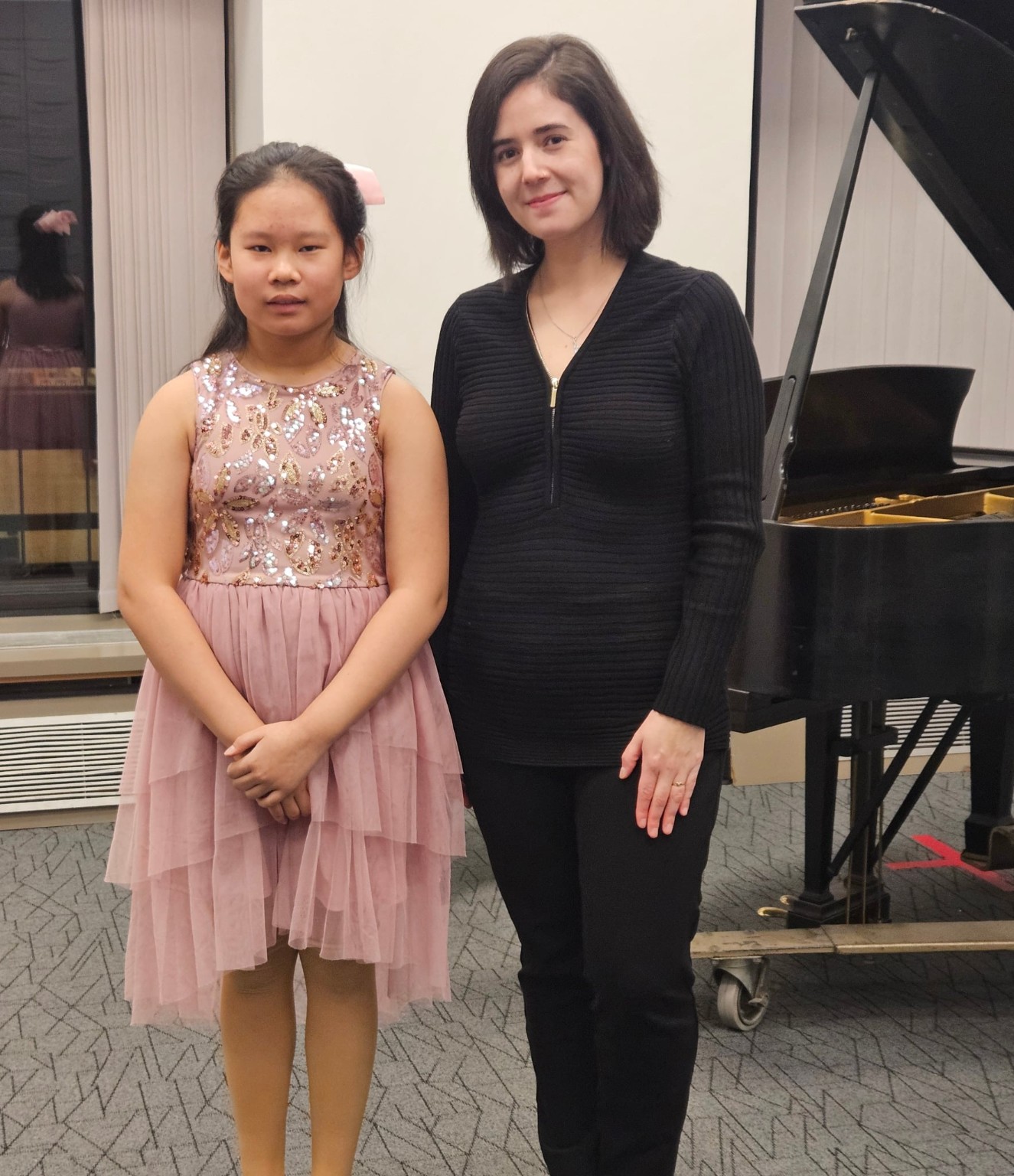 Rachelle Moore’s student, Sophia Fu receiving the RCM Regional Gold Medal of Excellence in Violin!